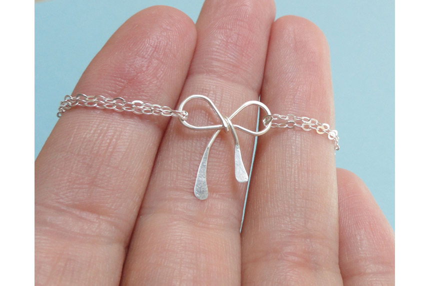 Silver Bow bracelets from Otis B Weddings